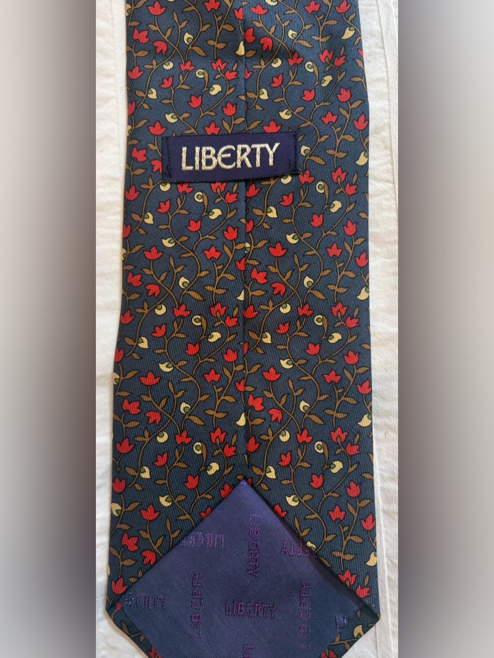 Liberty of London Navy Tie with Red Floral and Gold Accents